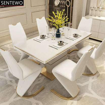 SENTEWO Table à manger de luxe moderne avec 8 chaises de salle à manger, base en acier inoxydable doré, plateau en verre trempé, chaise de dîner sirène