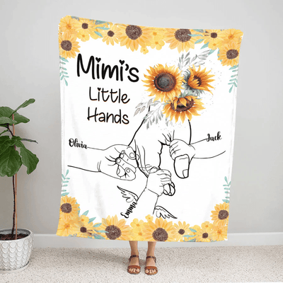 Mimi Hands Grandkids Blanket