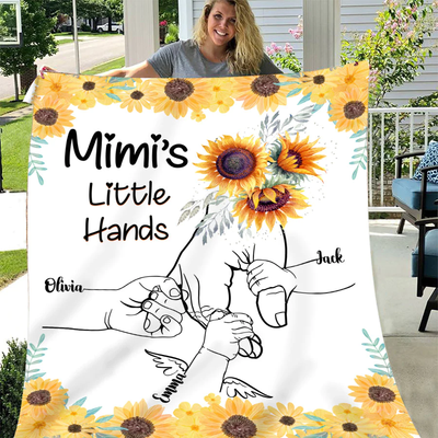 Mimi Hands Grandkids Blanket