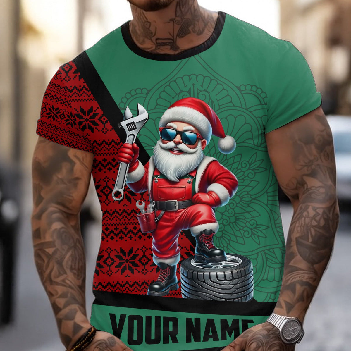Custom Santa Mechanic Christmas T-Shirt, Red & Green Holiday Design with Wrench, Tire & Nordic Pattern, Xmas Hoodie Gift for Men & Women
